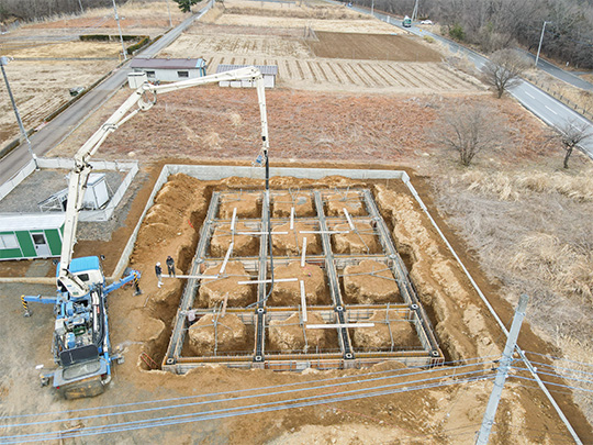 11_基礎コン打設.jpg